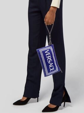 Versace blue and white logo clutch authentic